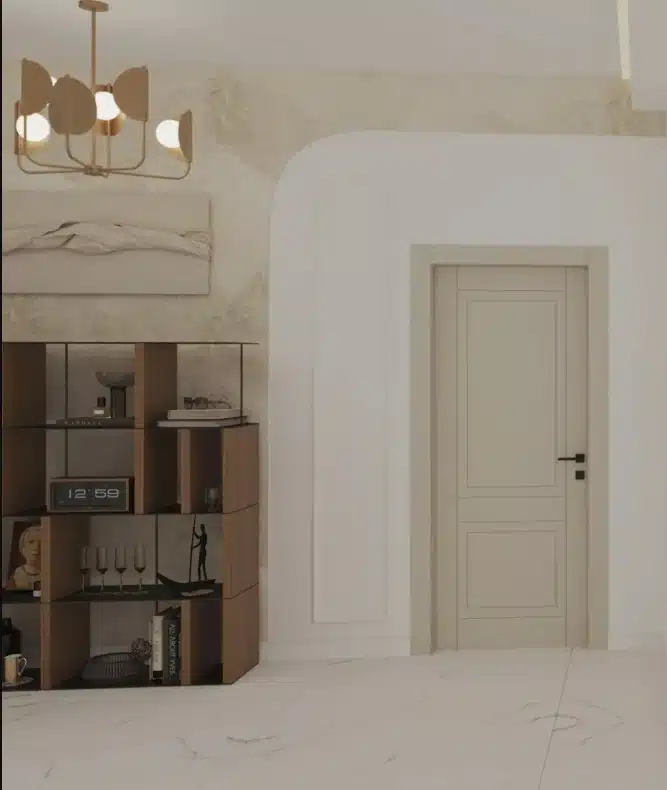 Interior modern cu ușă bej, bibliotecă din lemn și candelabru decorativ.